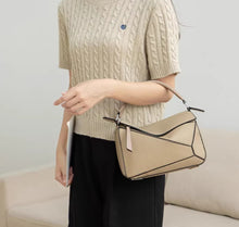 Hong Kong purchasing genuine leather bags 2024 new geometric bags, pillow bags, single shoulder hand-held crossbody spliced contrasting color women's bags