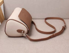 Color blocking autumn bag for women 2024 new fashionable and versatile leather small round bag, single shoulder crossbody bag, women's pillow bag