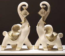 Home creative wealth elephant ornaments, a pair of living room TV cabinets, wine cabinets, light luxury high-end foyer wealth attracting decorations